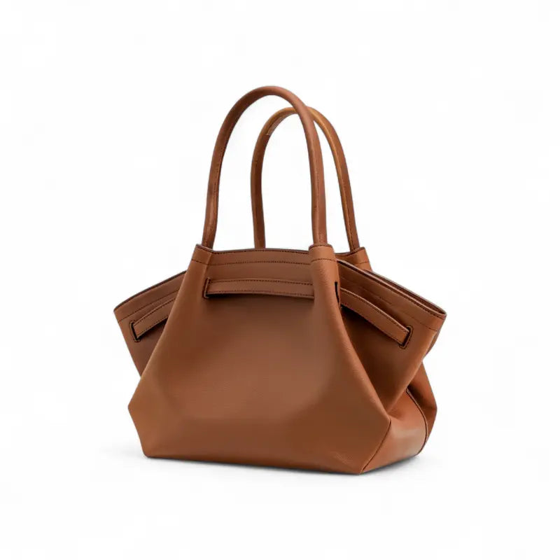 Bolsa feminina em couro genuíno marrom, vista frontal com alças curtas e design geométrico estruturado