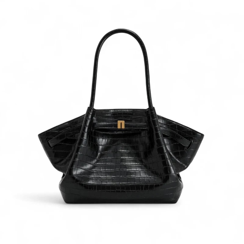 Bolsa feminina em couro sintetico preto com textura croco, vista frontal com fechamento metálico dourado e design moderno