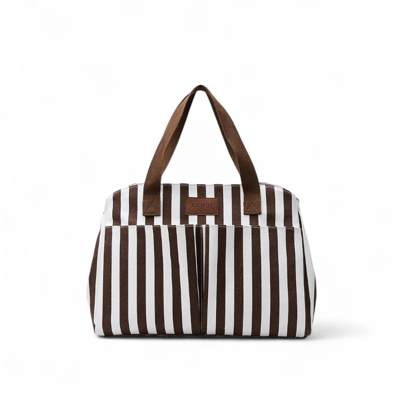 Bolsa feminina para trabalho e maternidade em tons neutros com listras marrom e branco. Alças confortáveis e acabamento resistente, ideal para uso no escritório ou passeios com bebê.