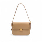 Bolsa transversal feminina bege com fecho dourado e alça ajustável em couro sintético.